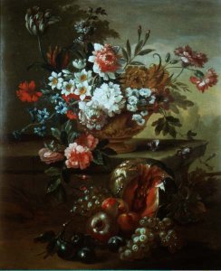 Still life of flowers in an urn with fruit