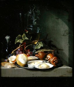 Still life of oysters and a peeled lemon on a ledge