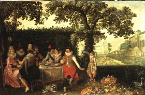 Elegant People Feasting at a Table