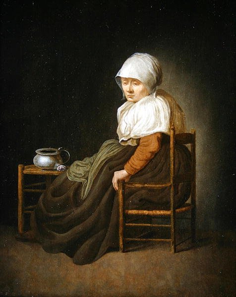 A woman seated in a chair