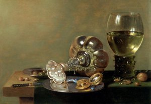 A still life with glass of wine, tazza and a pewter plate