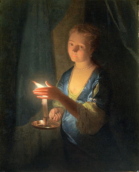 A Lady holding a Candle