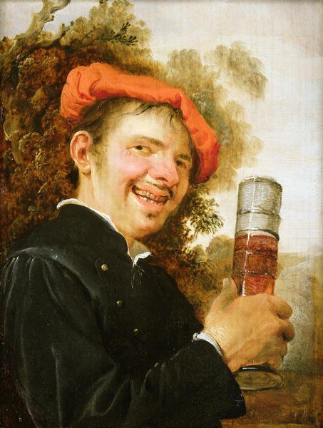 A man in a landscape, raising a beer glass