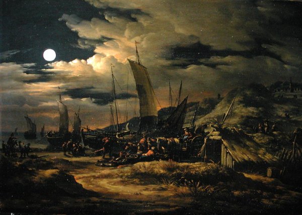 Seashore by moonlight with fishermen unloading their catch