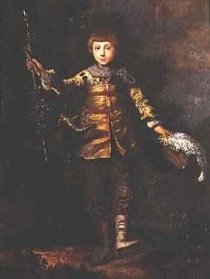 Portrait of a young boy dancing in a wood