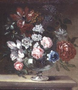 Roses tulips and other flowers in a vase