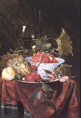 Still life with wild strawberries plums grapes and a lemon on a draped ledge