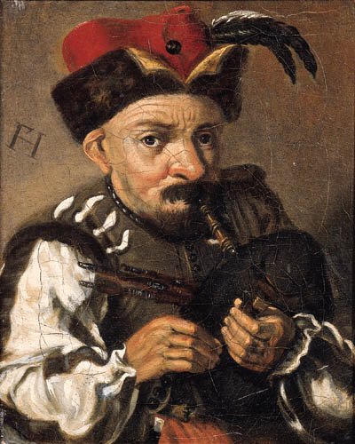 A man playing the bagpipes