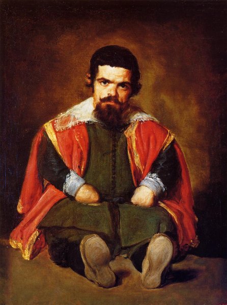 A Dwarf Sitting On The Floor