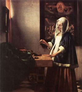 Woman Holding a Balance 1662-63