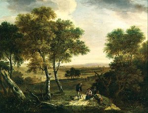 An extensive wooded landscape with peasants by a path, a town beyond