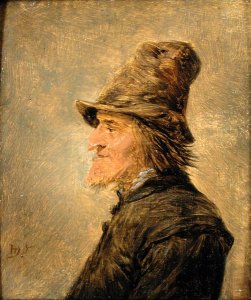 Portrait of man with a beard, in profile, wearing a straw hat