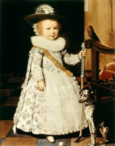 Portrait of a Young Boy with a Golf Club and Ball