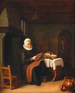 Lady seated in front of a fireplace with ham and bread on a table