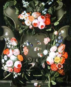 A stone cartouche adorned with bouquets of flowers